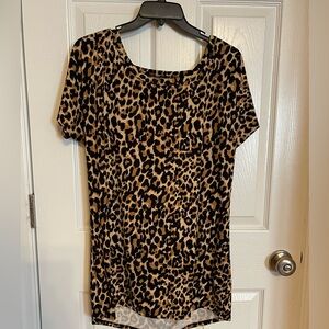 Stylish and comfortable blouse!  Animal print, V back detail, buttery feel.